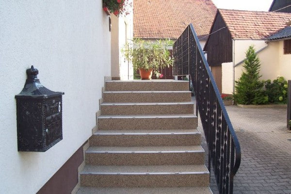 Treppenbelag mit eingebauter Wasserabführung